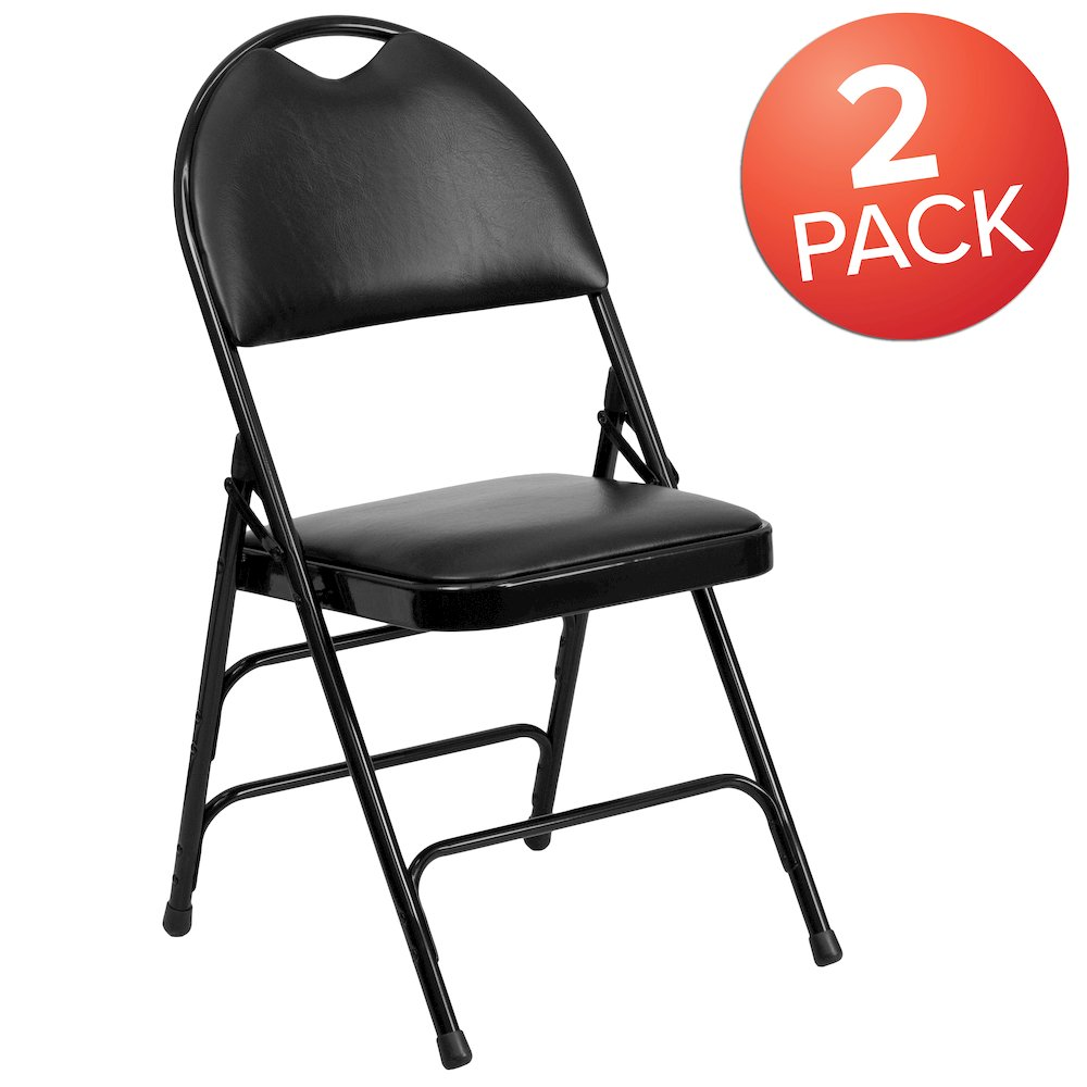 Two black HERCULES Series vinyl metal folding chairs with triple bracing and easy-carry handles, ideal for versatile furniture use.