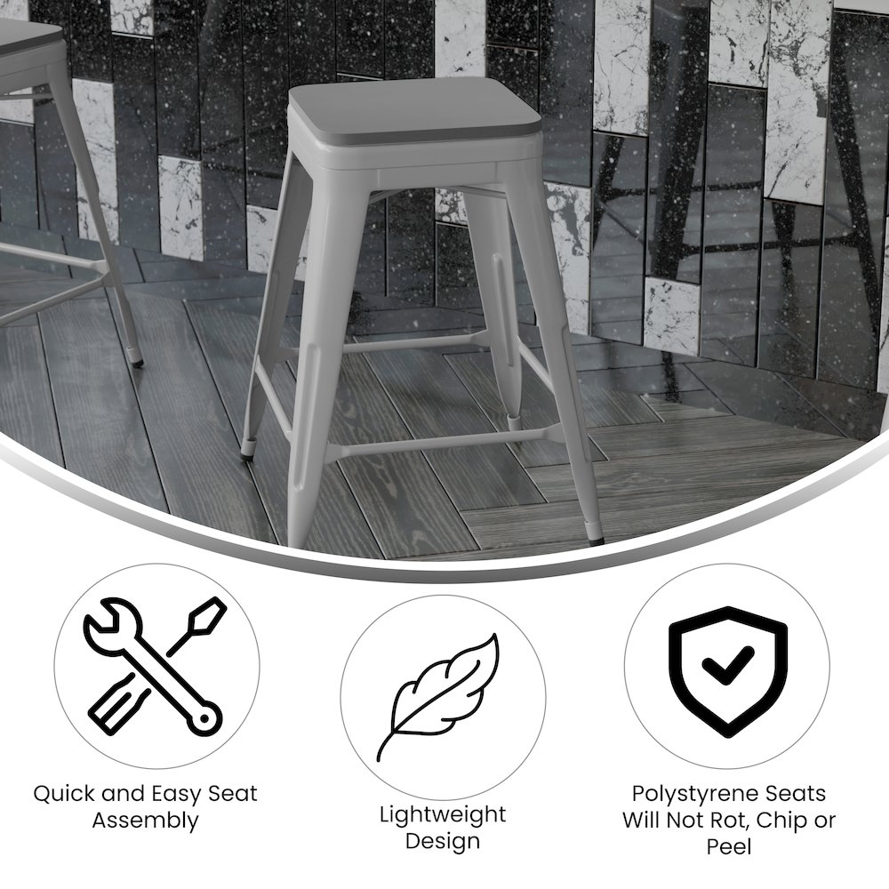 Set of four Start2Finish silver metal counter height stools with backless design and gray all-weather poly resin seats.