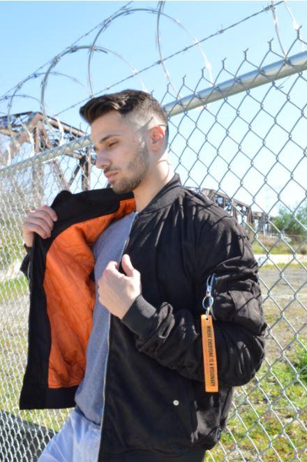 Black Lime Milo faux suede bomber jacket, stylish and lightweight, featuring a classic fit with zip closure and ribbed cuffs.