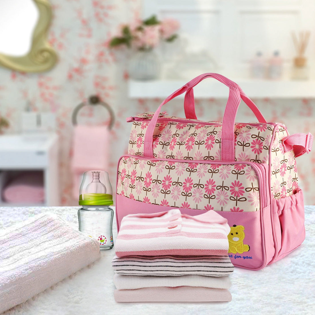 Pear Daisy 5-piece baby diaper bag set, including shoulder bags with multiple compartments, ideal for organizing baby essentials.