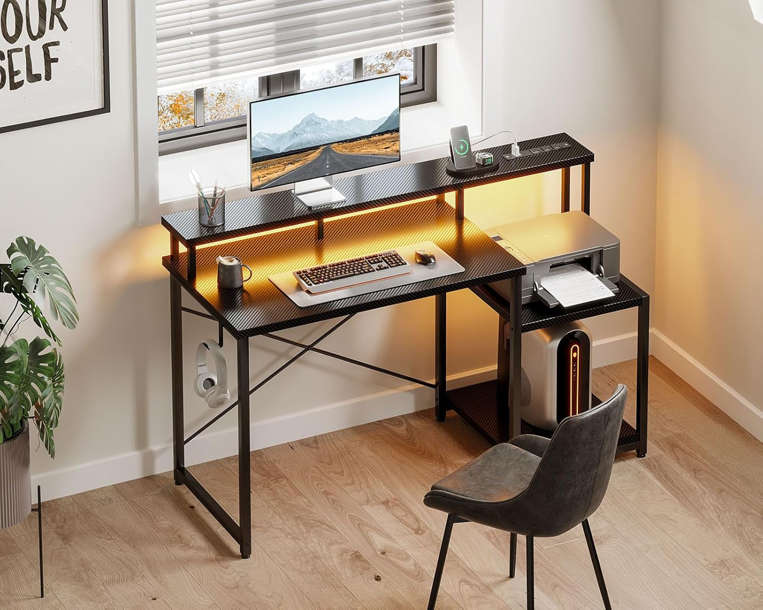 Peach Maple 48-inch LED gaming desk with built-in power outlet and shelves, featuring a spacious black surface and modern design.