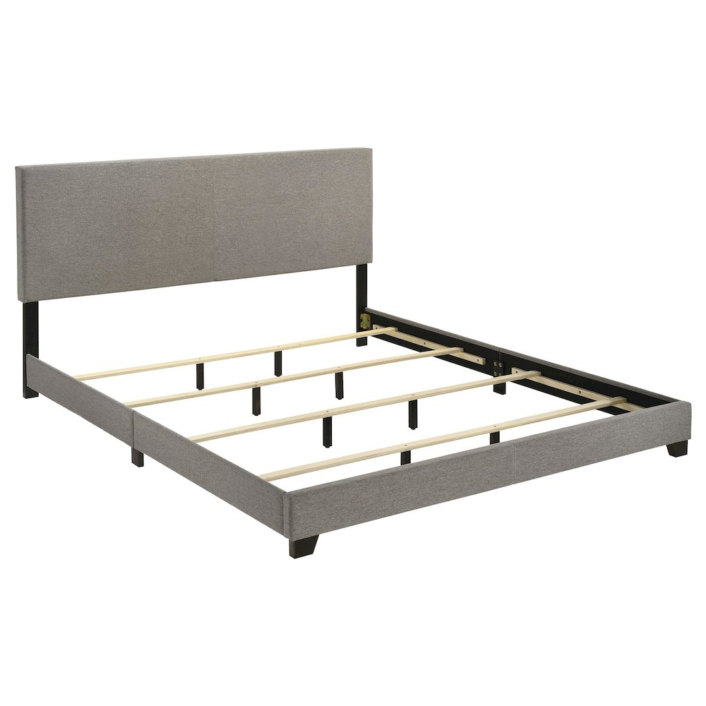 Eastern King panel bed with taupe fabric upholstery and a stylish design by Start2Finish.
