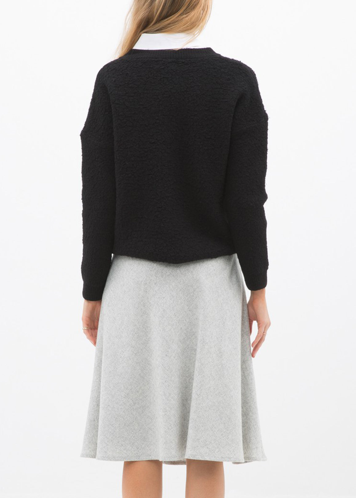 High waisted wool knit midi skirt in Heather Grey by Lemon Hera, showing soft, textured fabric and classic A-line silhouette.
