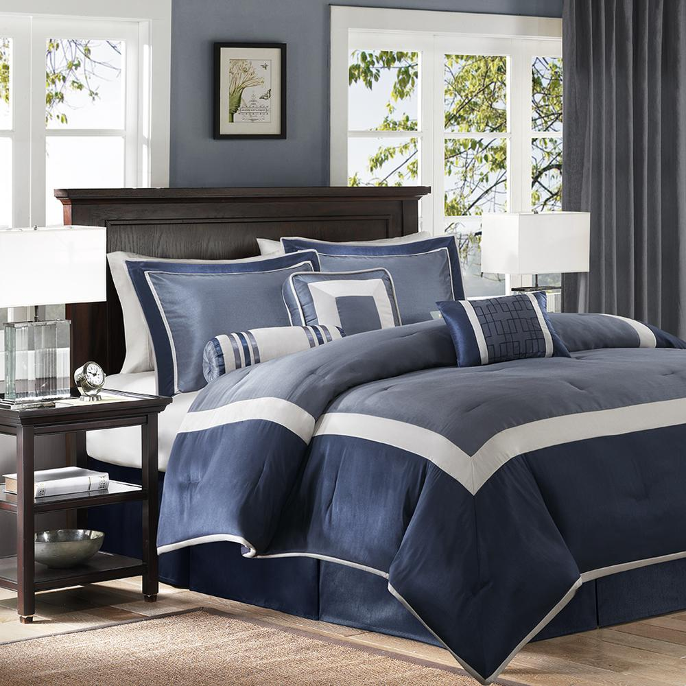 Genevieve 7-piece navy comforter bedding set by Start2Finish, featuring a cozy comforter, matching pillow shams, and decorative accents.
