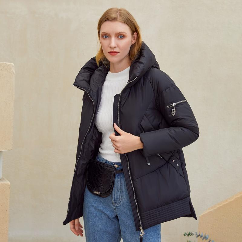Women’s padded winter coat by Jade with hood, zipper pockets, and casual parka style, ideal for cold weather.