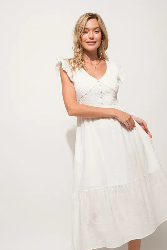 Pear Daisy ruffle sleeve front smocked tiered midi dress featuring a flowy design and floral pattern, perfect for casual wear.
