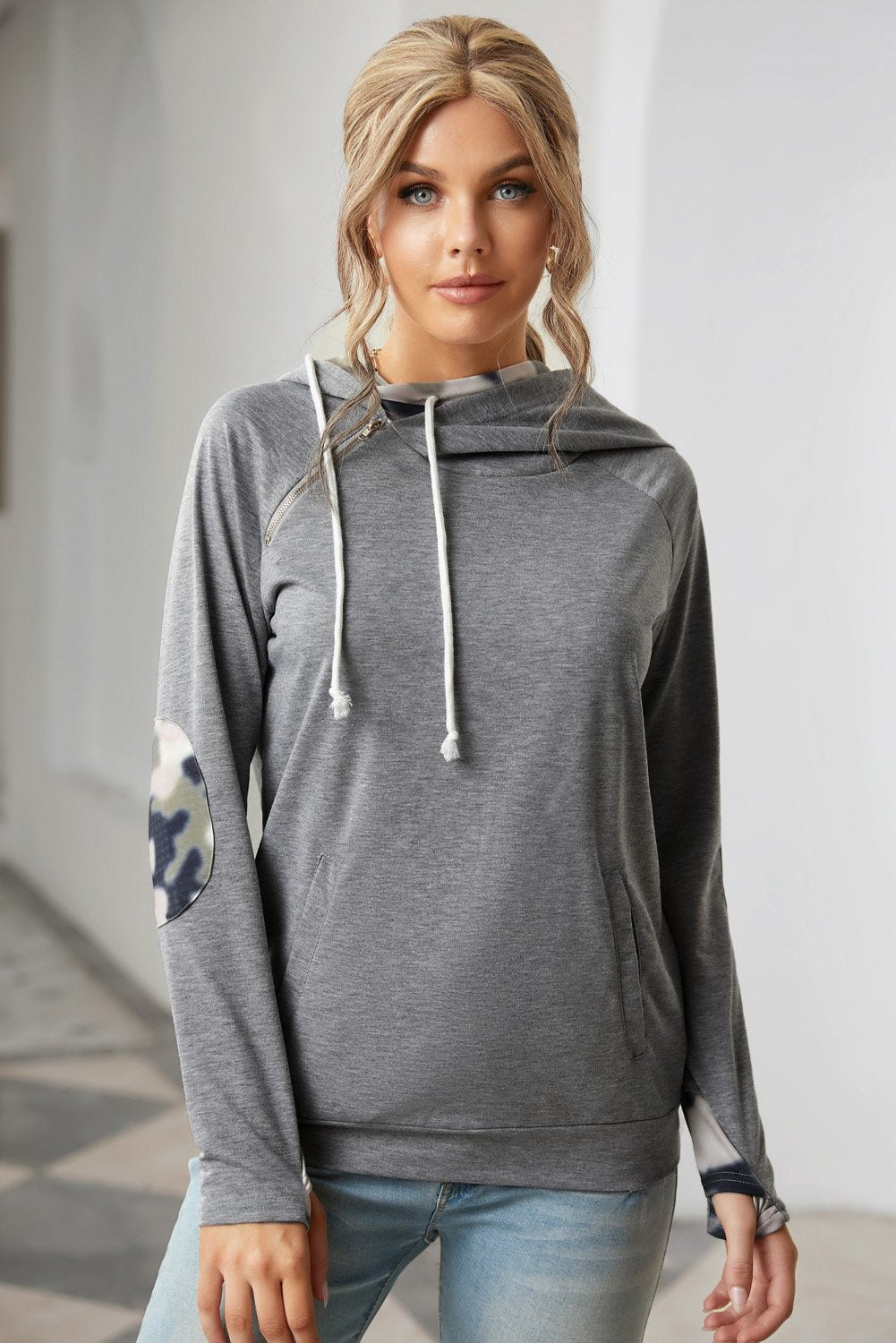 Elegant blouse from Start2Finish, showcasing stylish apparel with matching accessories on a neutral background.