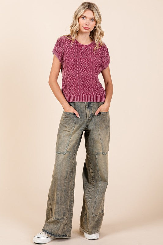 Jade Icarus Mittoshop washed wide-leg jeans with pockets, showcasing denim fabric and relaxed fit style.