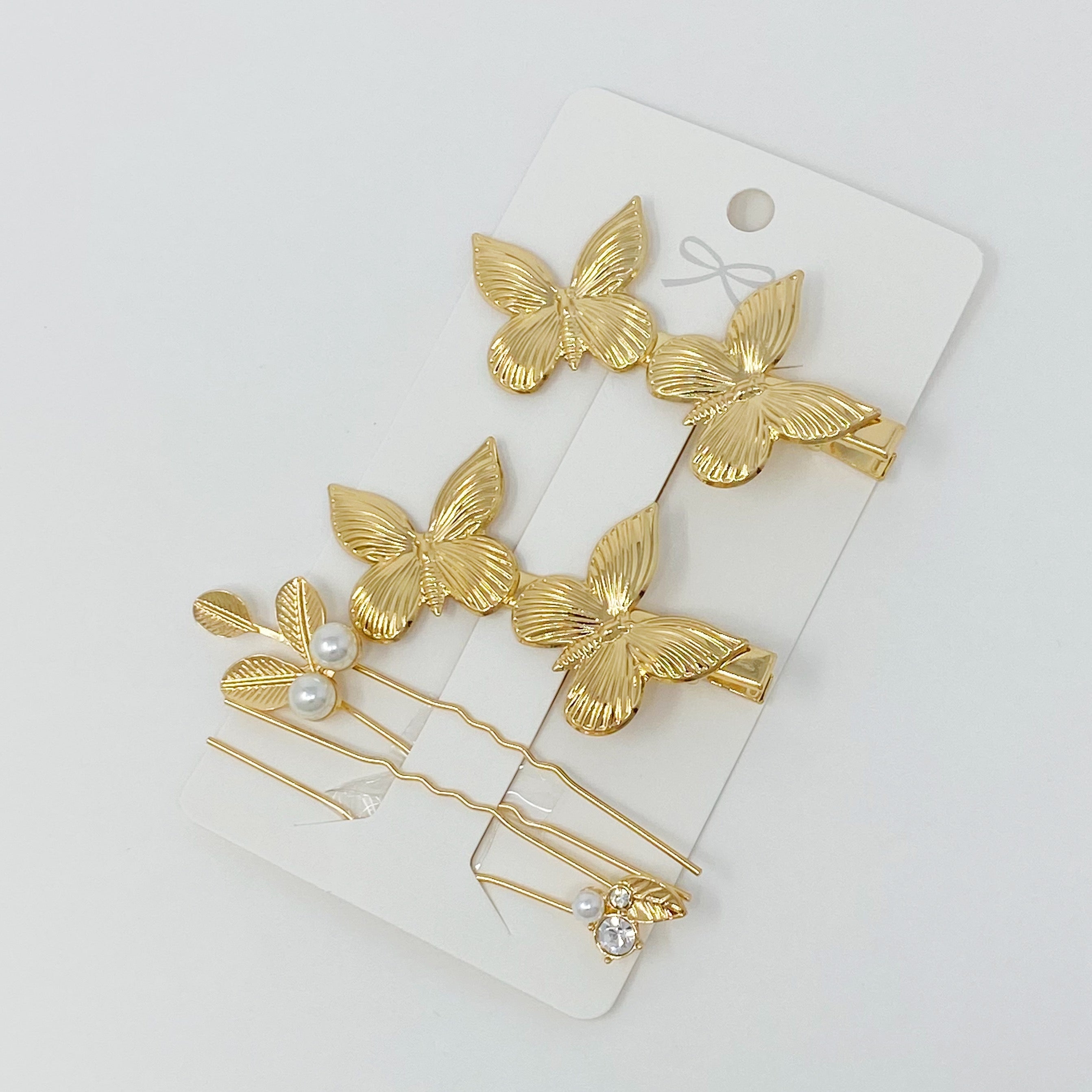 Antique garden-themed hair clip set by Fuchsia Hercules featuring vintage floral jewelry accessories for hair styling.