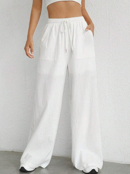 Carmine Juneberry drawstring wide-leg pants in lightweight fabric with relaxed fit and high waist.