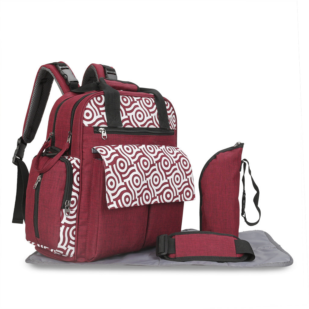 Maroon Asteria large capacity multi-function mommy bag with multiple compartments and sturdy handles, designed for moms on the go.