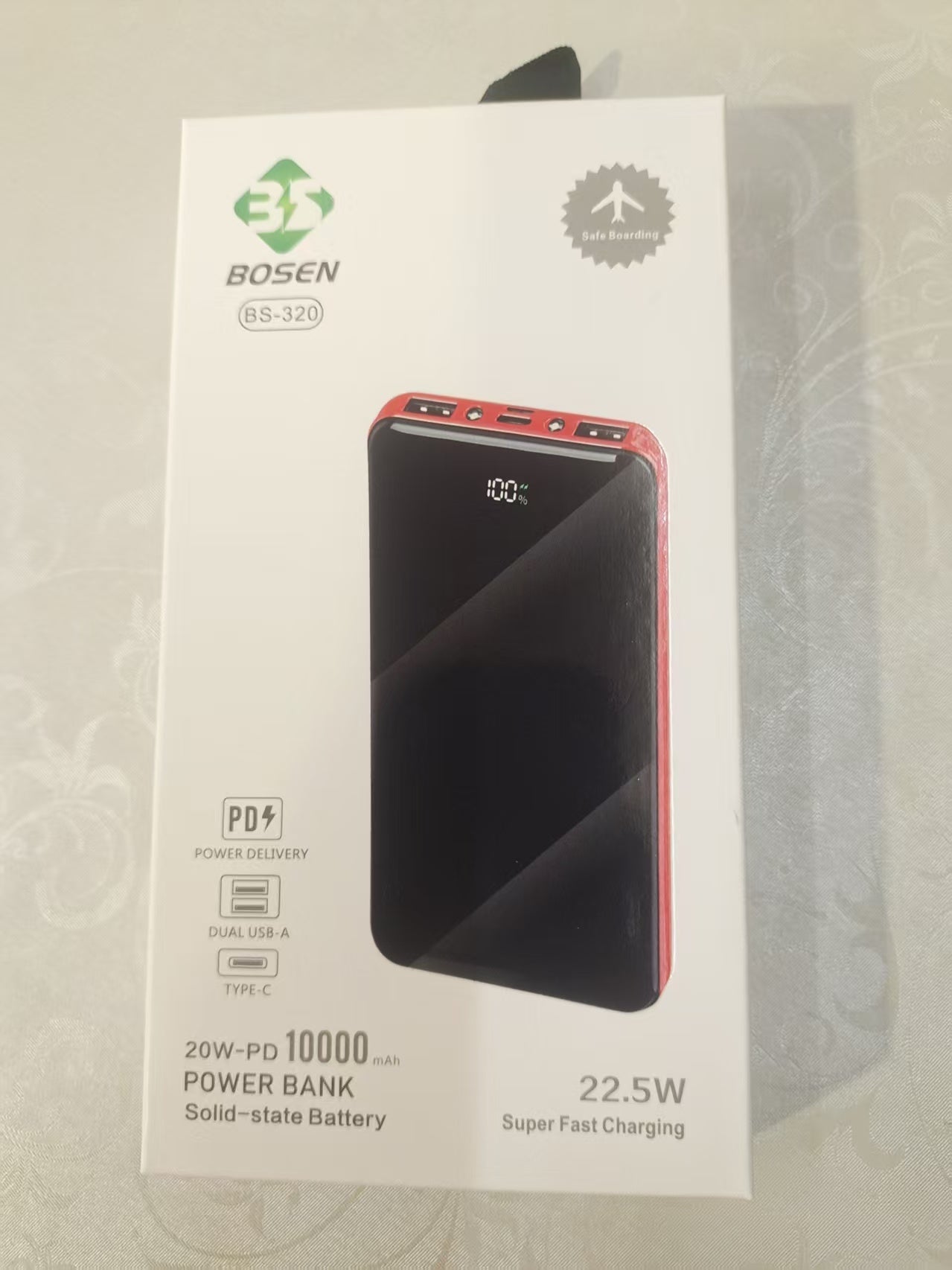 Pear Daisy portable power bank for fast charging, universal battery pack compatible with iPhone and other devices.