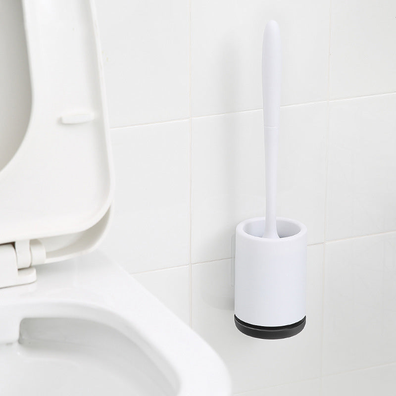 Teal Simba bathroom floor cleaning brush with handle and sturdy bristles, designed for effective bathroom cleaning.