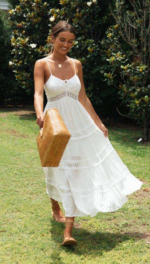 Carmine Juneberry boho sling dress with lace panels and a swing skirt, flowing and stylish for casual or summer wear.