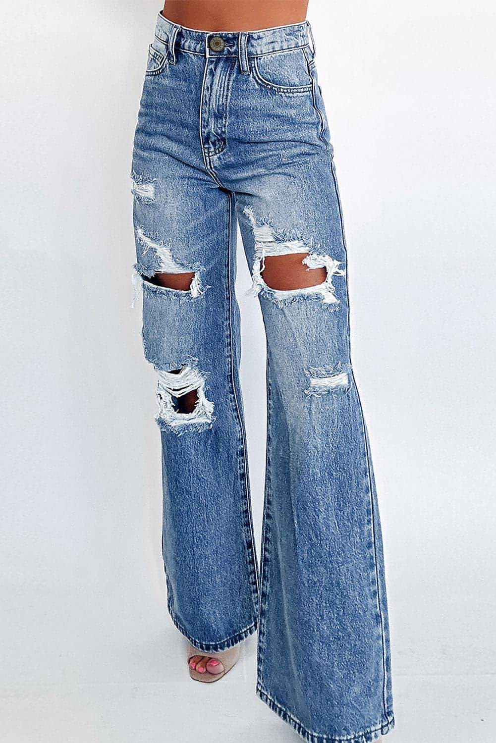 Carmine Juneberry Ashleigh blue acid wash distressed wide leg high waist jeans with ripped details and relaxed fit.