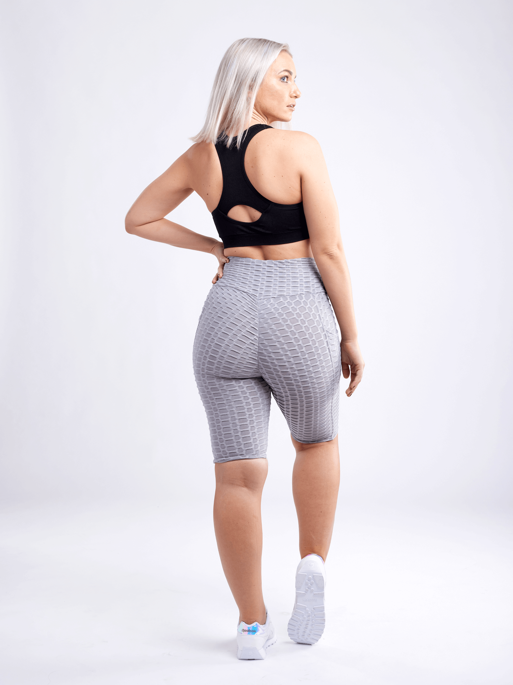 Black Lavender JupiterGear high-waisted scrunch yoga shorts with hip pockets, designed for activewear and comfortable movement.