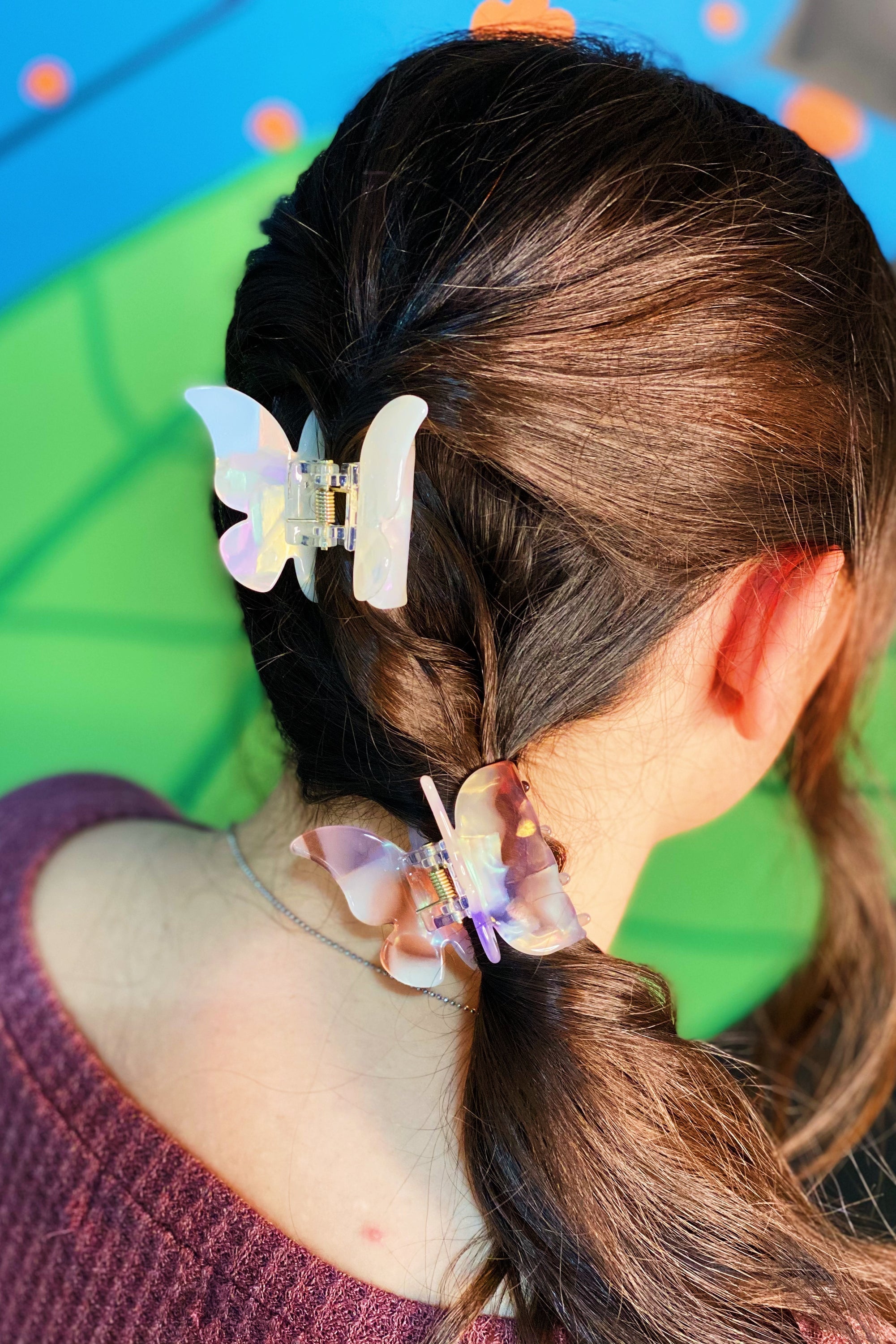 Fuchsia Hercules butterfly-shaped hair claw jewelry accessory with detailed design for stylish hair styling.