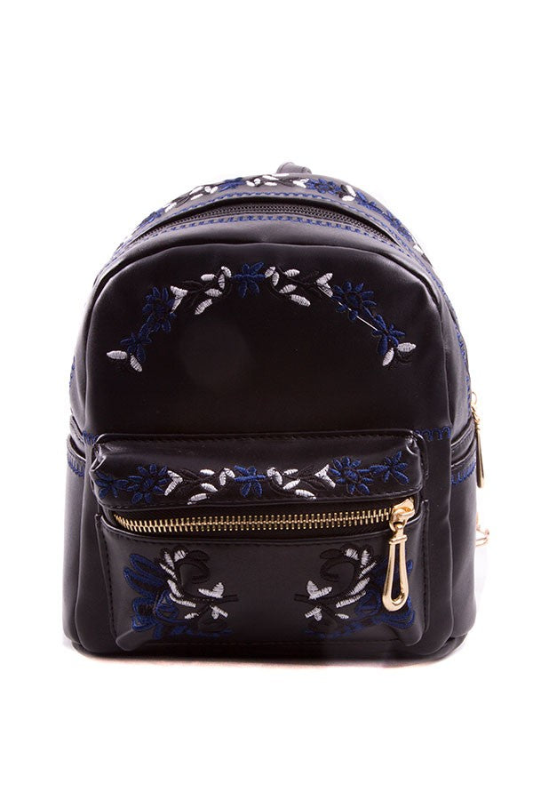 Lavender Tartarus embroidered backpack with floral design, featuring adjustable straps and multiple compartments.