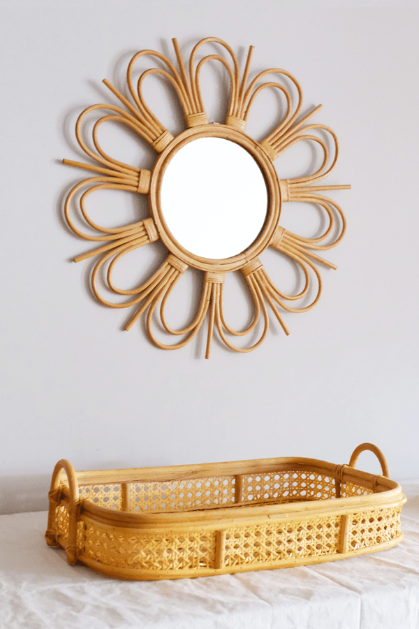 Start2Finish flower rattan mirror with round frame and intricate woven design, suitable for modern or bohemian decor.