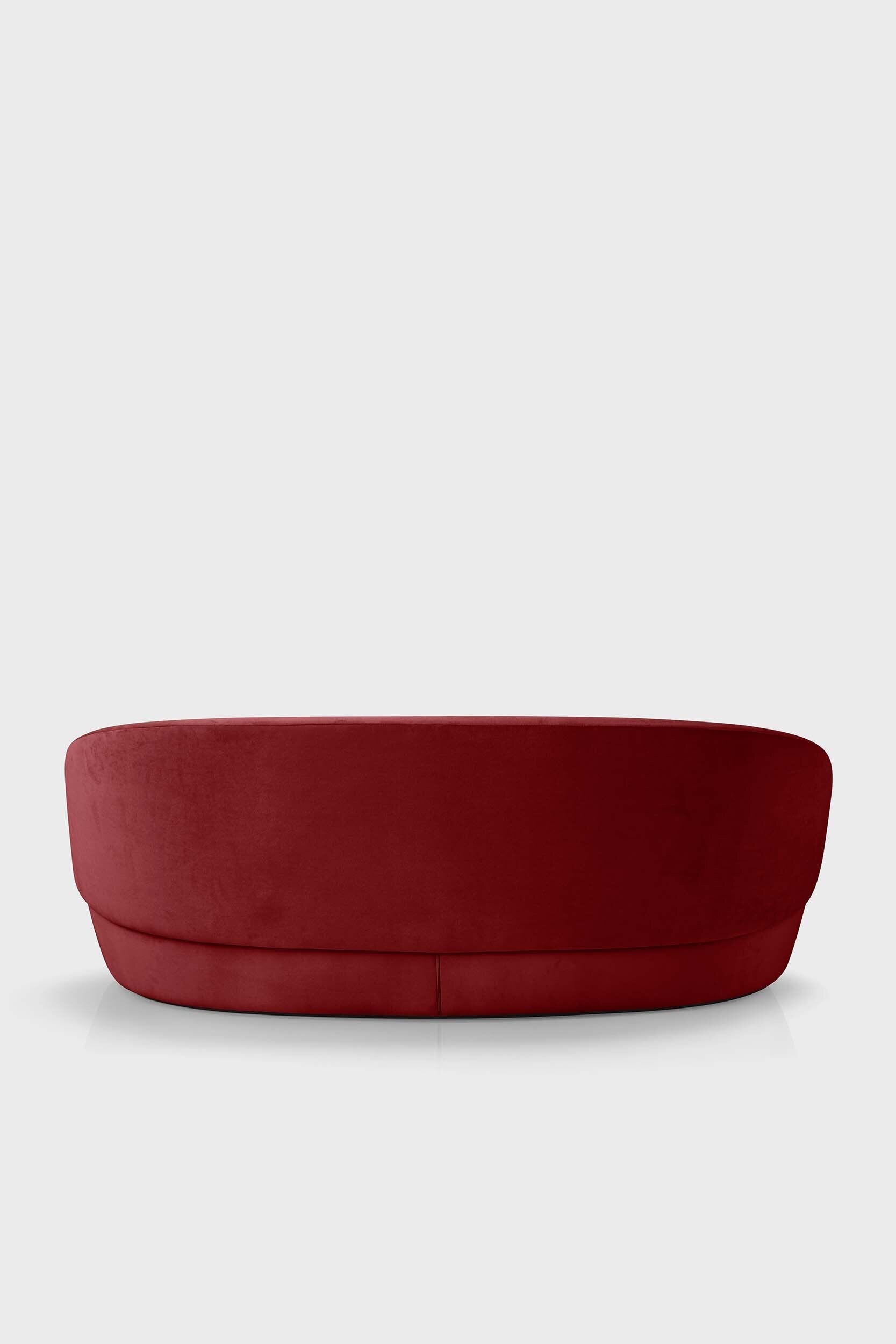 Aquamarine Poppy Naïve Sofa with bordo fabric and cushioned seating, modern furniture piece in a contemporary living room setting.