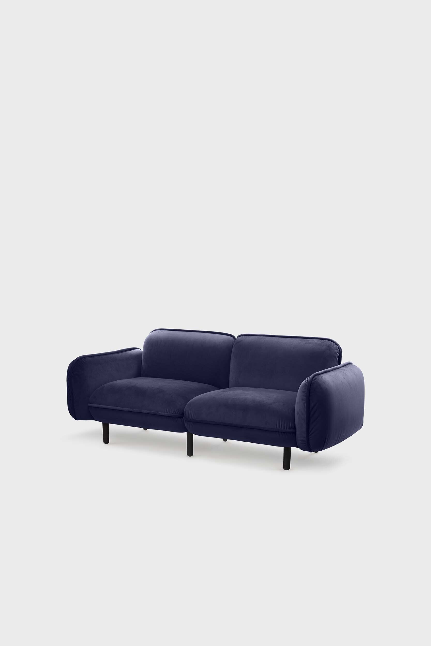 Blue Aquamarine Poppy Bean Sofa with plush fabric and modern design, shown in a cozy living room setting.