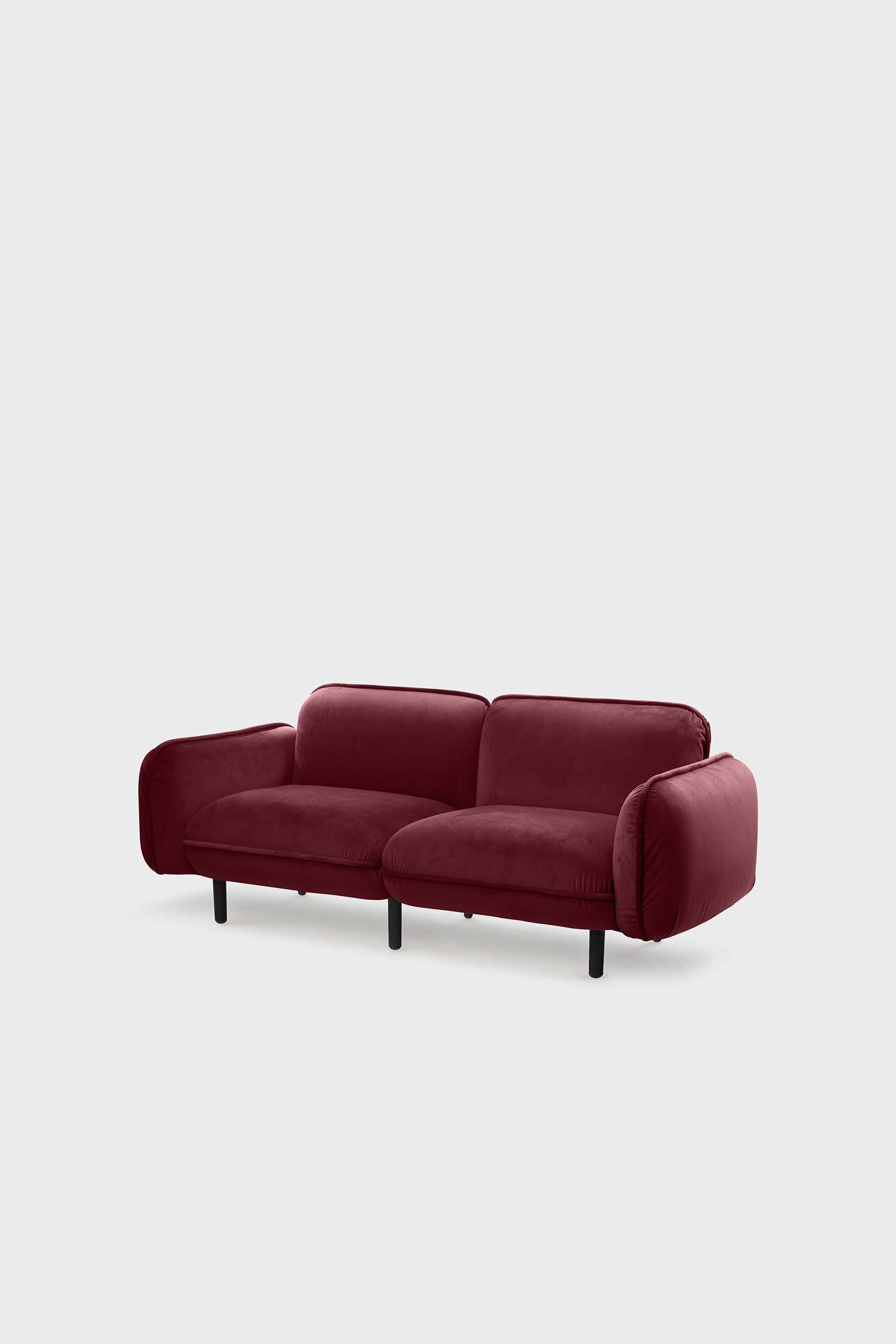 Aquamarine Poppy bean sofa in rich bordo fabric, modern furniture piece with plush cushions and sleek design.
