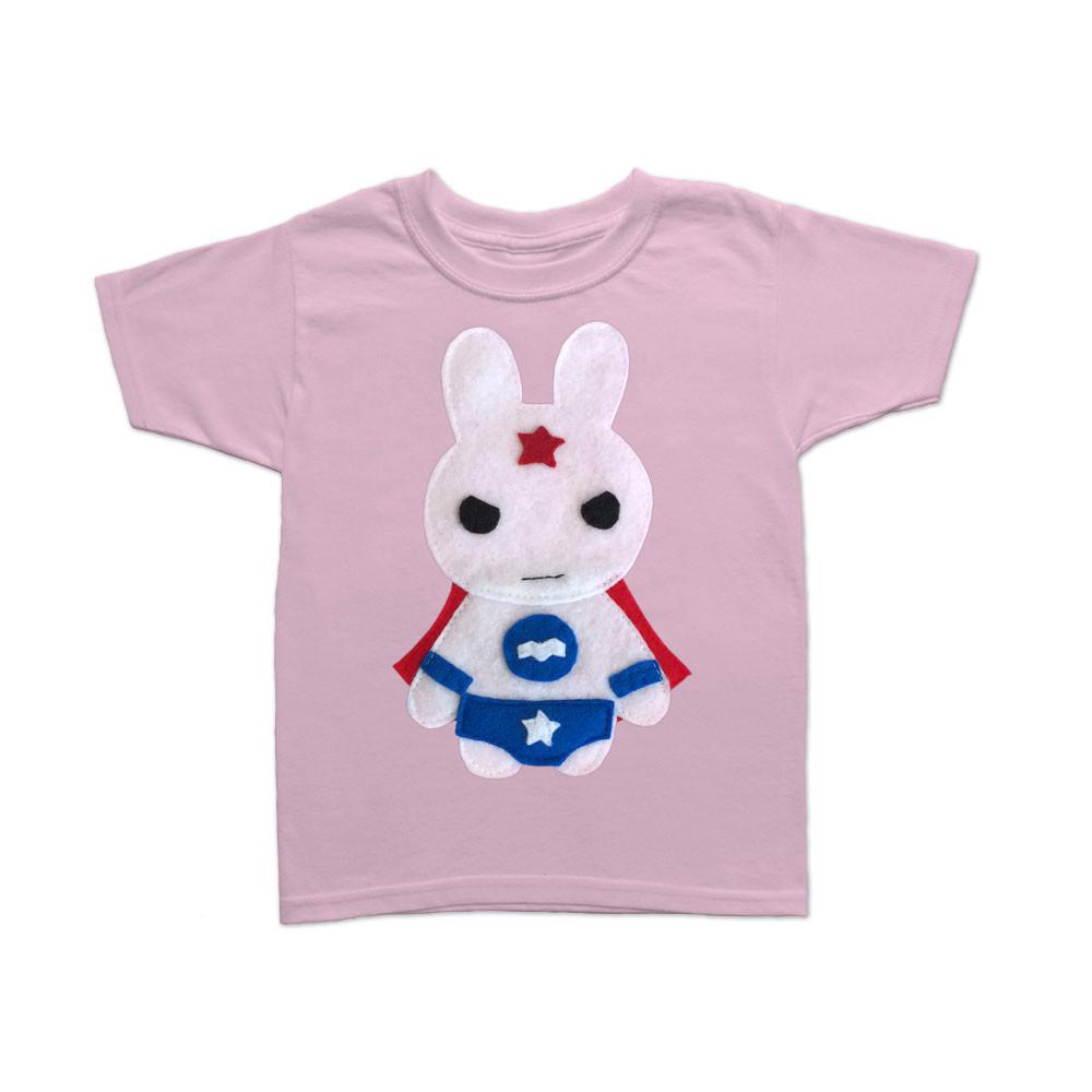 Toddler girl wearing Sky Blue Milo Kids Superhero Cape and Shirt featuring a bunny girl design, perfect for imaginative play.