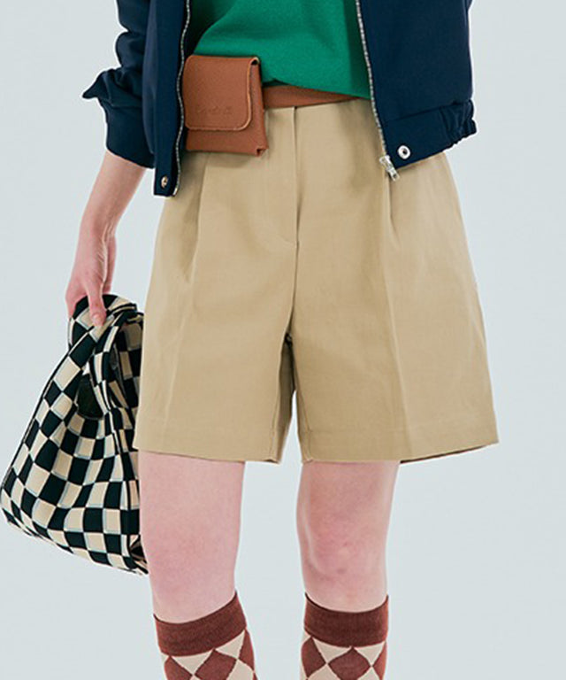 Beige BENECIA 12 Butter Bermuda Shorts by Amethyst Lucy, showing the comfortable fit and stylish design in natural fabric.