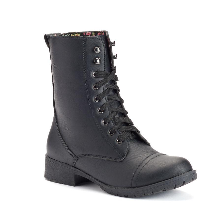 Azure Ophion COMBAT footwear showing rugged combat boots with sturdy leather and metal details.