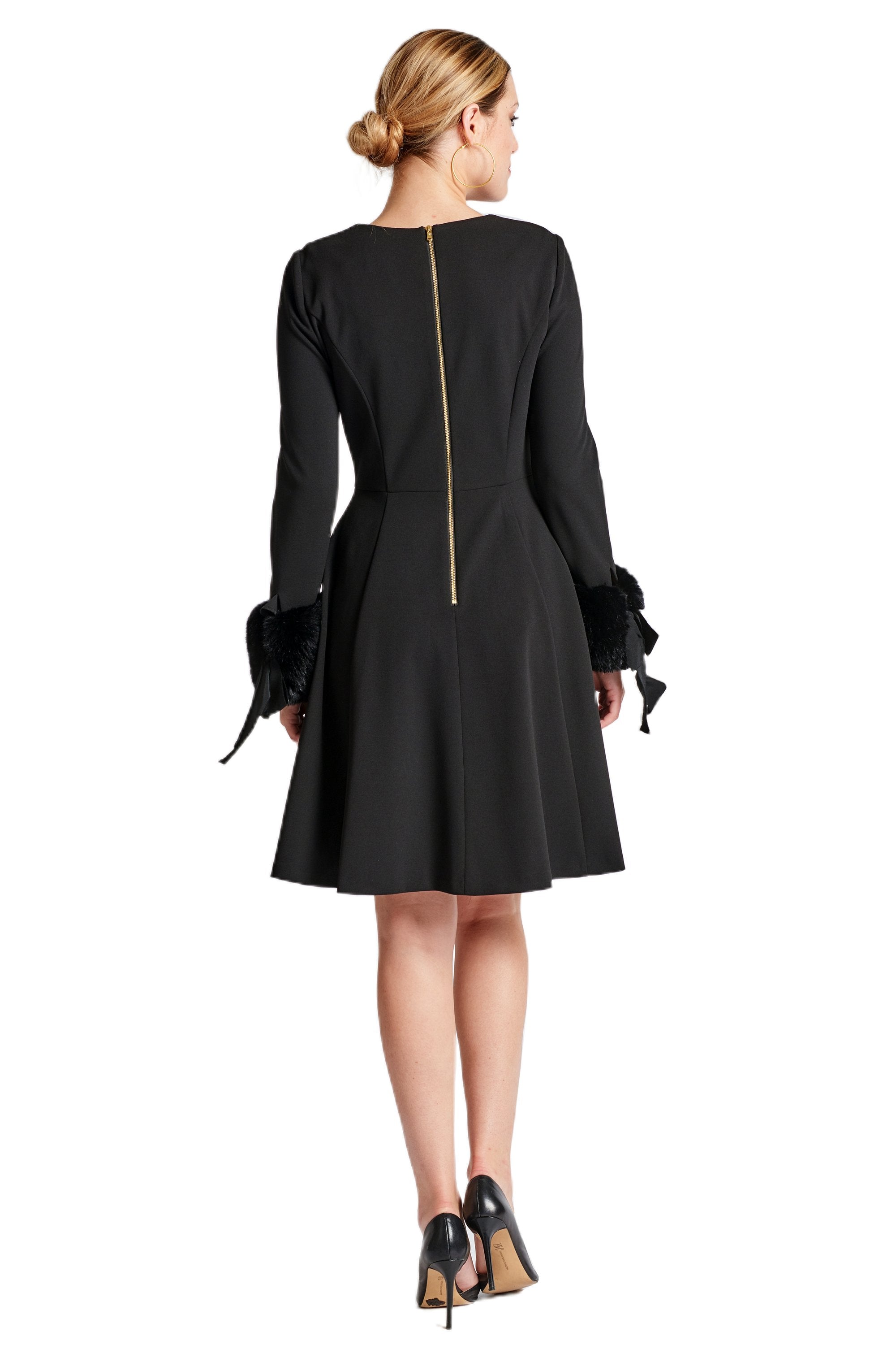 Back view of Peach Dionysus Caroline Dress, a black long sleeve fit and flare dress with faux fur details.