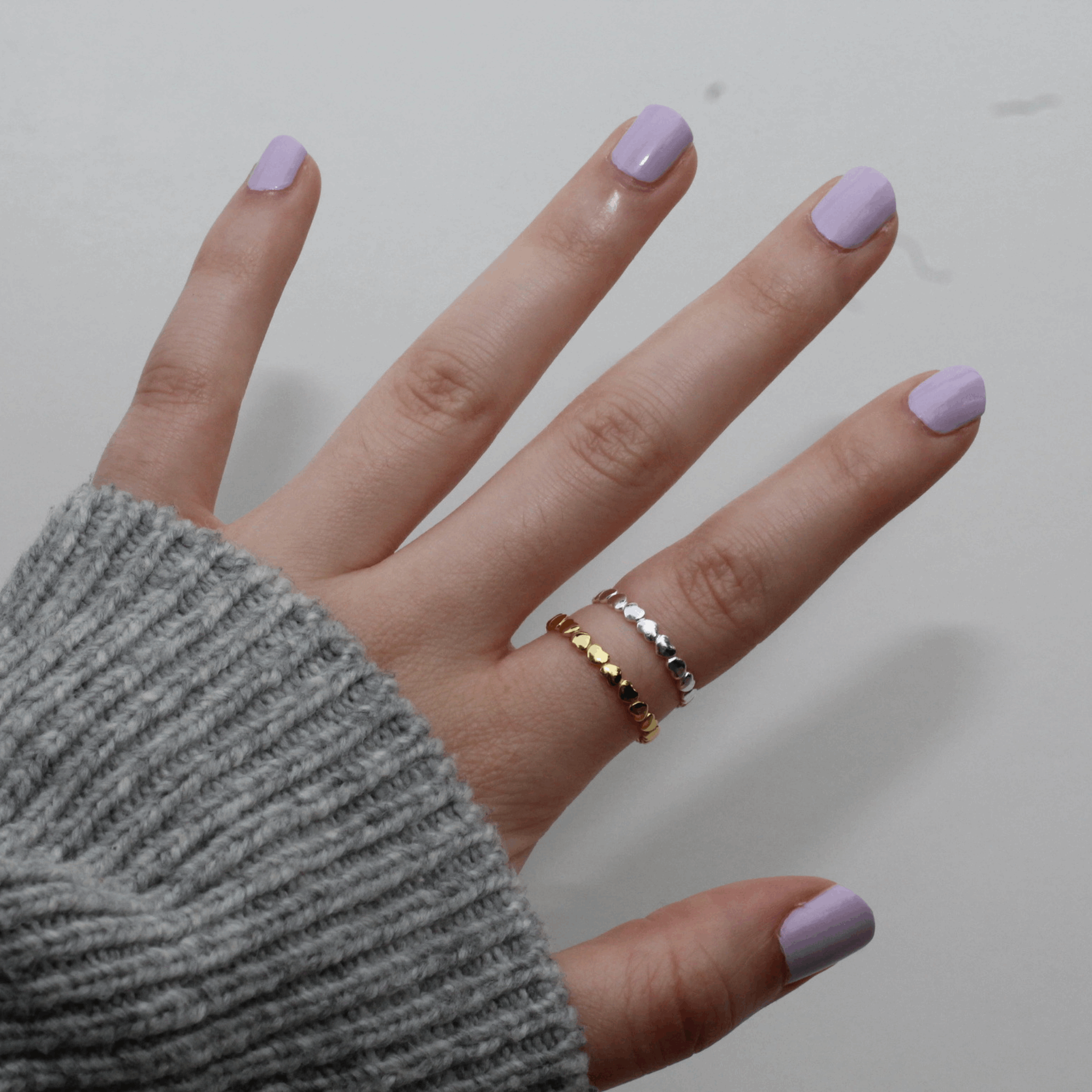 Cerise Poppy Circle of Love ring on a person&