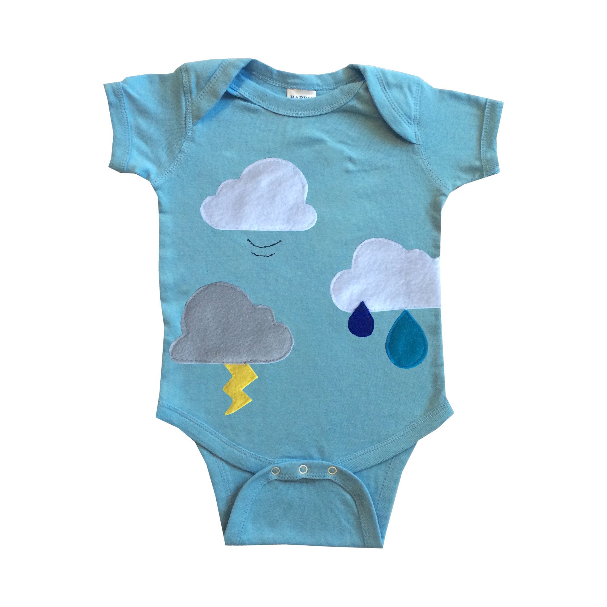 Baby wearing Sky Blue Milo Clouds Are Everywhere onesie with cloud patterns, soft fabric, and playful design for kids and babies.
