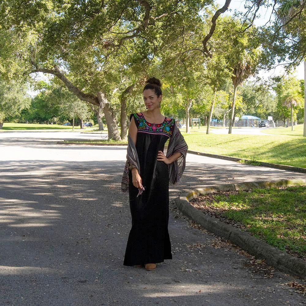 Black Maxi Isidra dress by Violet Athena featuring hand-embroidered colorful floral designs for women&