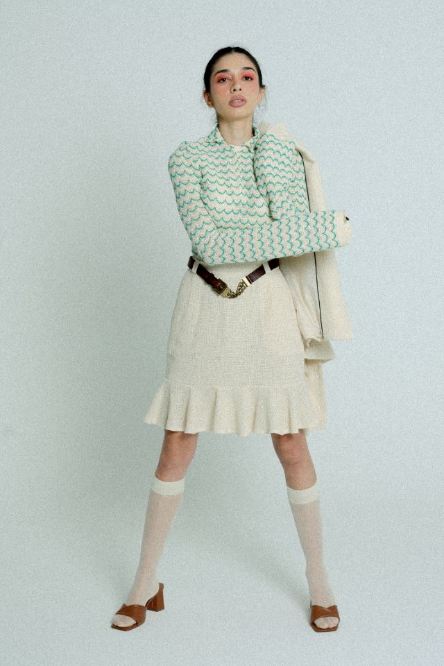 Green lightweight long sleeve cotton knit button-up shirt for women by Raspberry Molly, shown on a model.