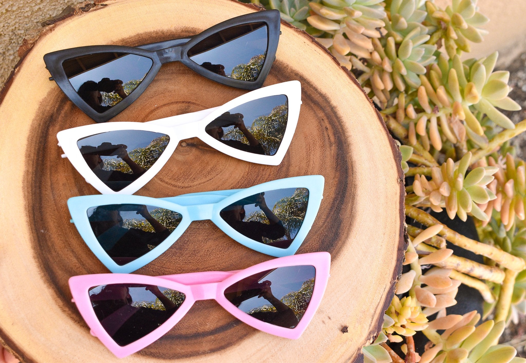 Scarlet Gaia dog sunglasses for pets with black frames and tinted lenses, designed to protect dogs&
