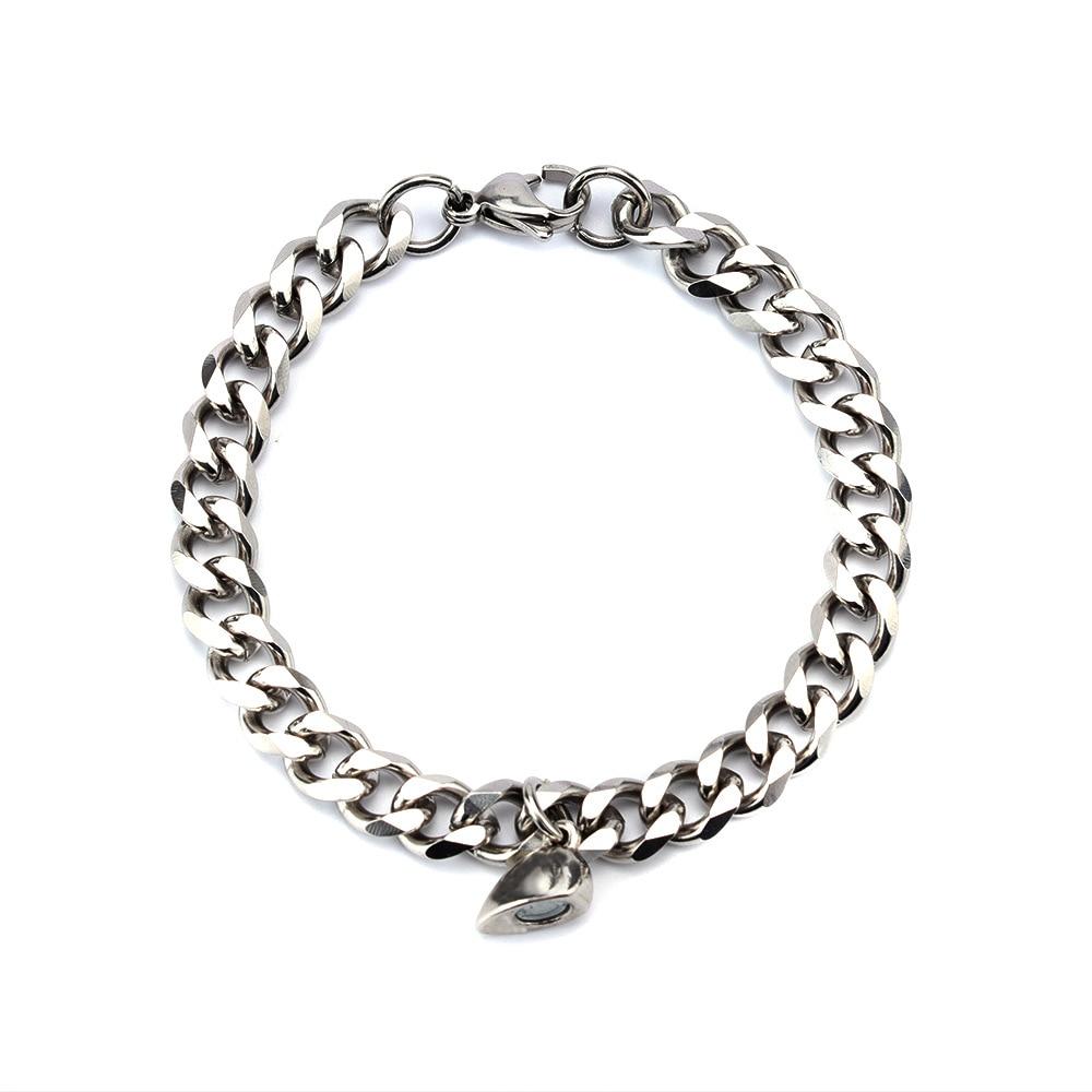 Silver Juneberry stainless steel couple bracelets with magnetism heart charms and Cuba chain design.