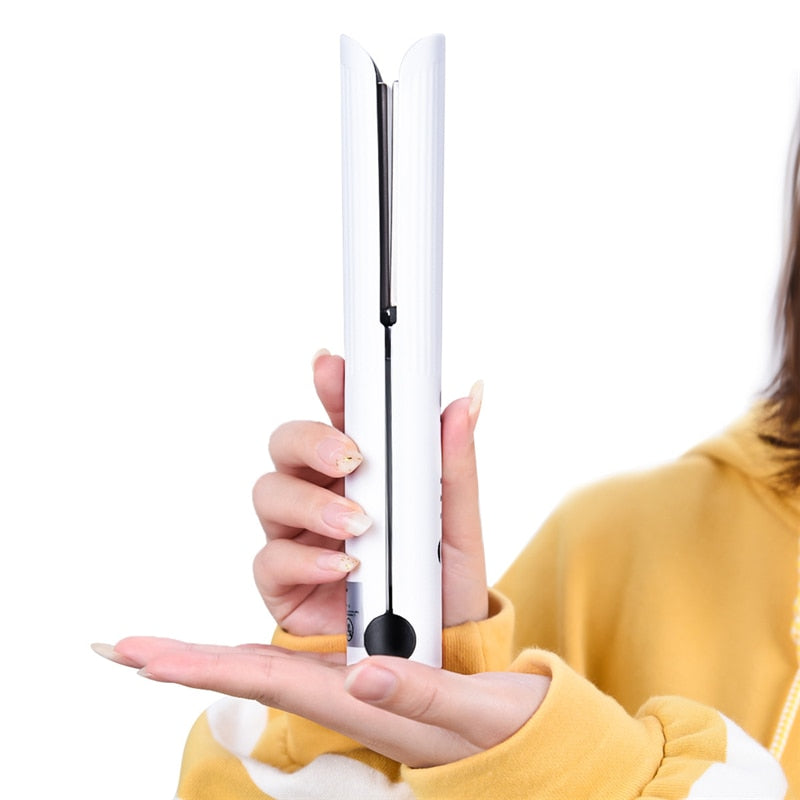 Maroon Asteria cordless rechargeable ceramic hair straightener and curler with a sleek flat iron design for versatile hair styling.