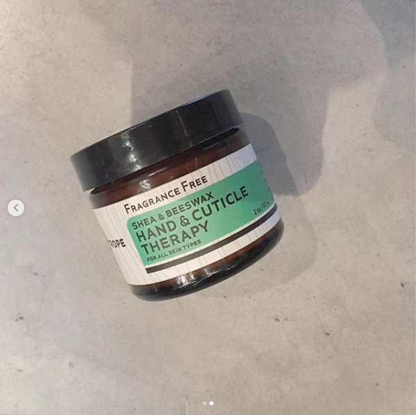 Orange Leto Shea and Beeswax Hand and Cuticle Therapy in a jar, showing the nourishing cream with natural ingredients.