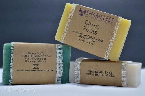 Organic coconut soap by Burgundy Crius, vegan healthcare soap with natural coconut ingredients, showing a bar of soap on a neutral background.