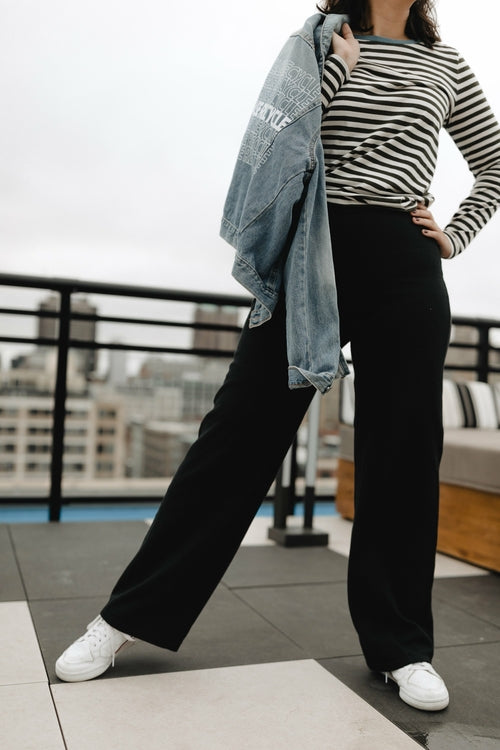 Wide leg alpaca cotton pants from Silver Chrysanthemum featuring a relaxed fit and soft, textured fabric in a neutral color.