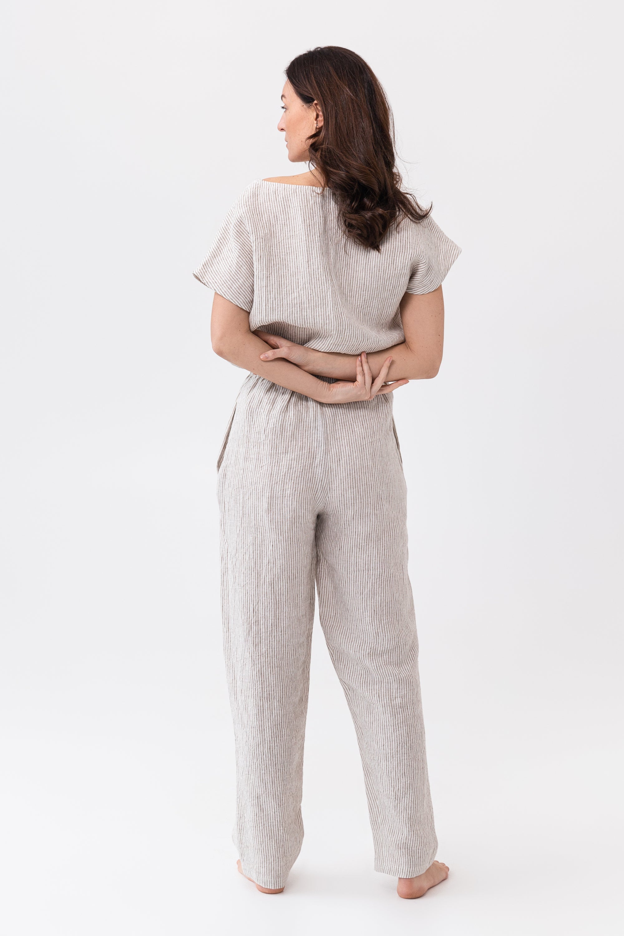 Striped beige linen pajama set from Magenta Sugarplum, soft linen loungewear with a relaxed fit and natural beige and white stripes.