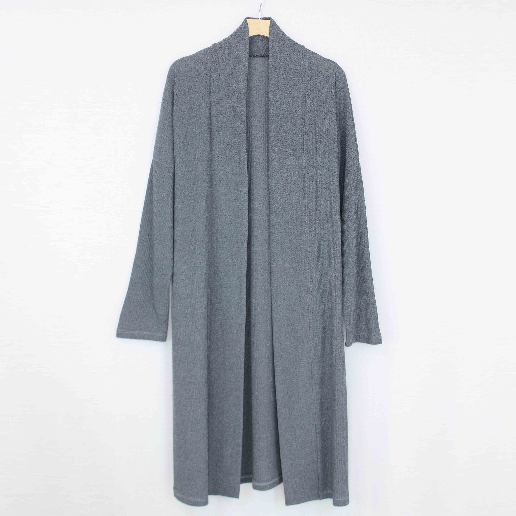 Yellow Hera long sleeve maxi cardigan displayed flat, featuring a soft knit fabric and open-front design for cozy, stylish layering.