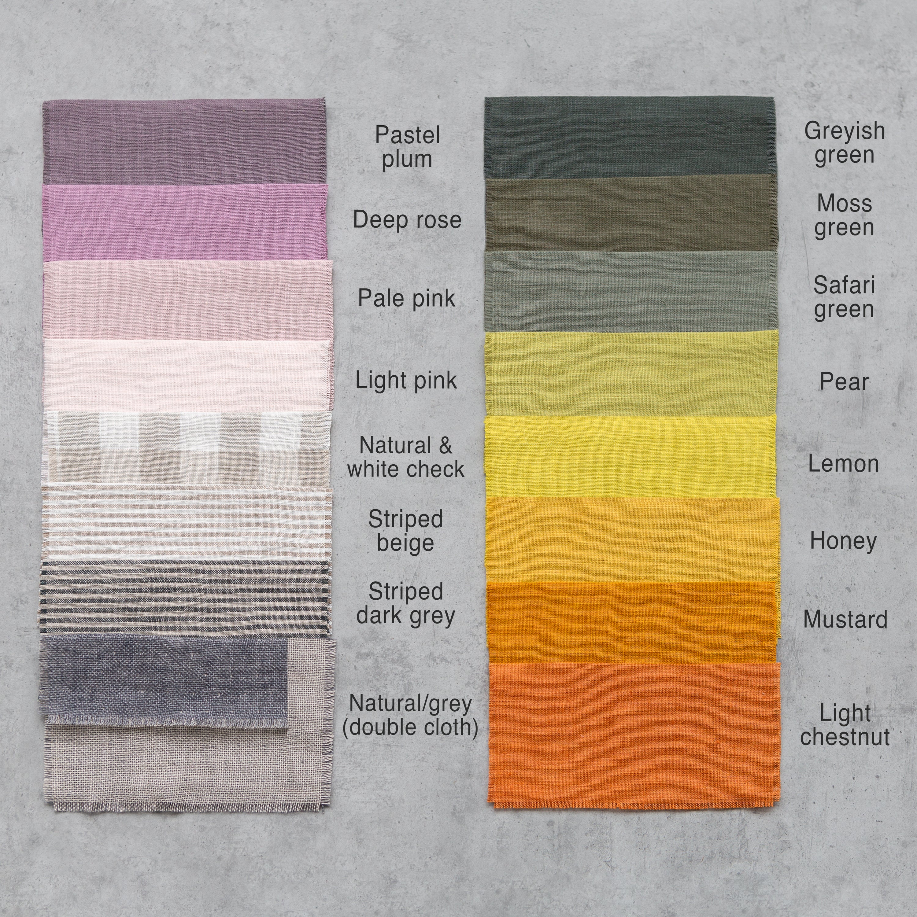Grey linen curtain with rod pocket from Magenta Sugarplum, showcasing a smooth fabric drape hanging on a curtain rod.