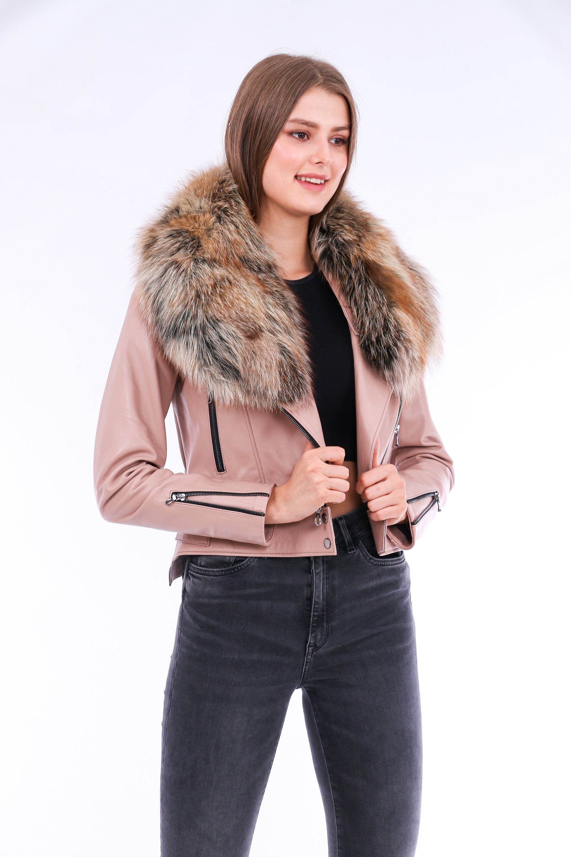 Pink leather biker jacket by Sangria Iapetus, featuring classic design with lapels, zippers, and structured fit.