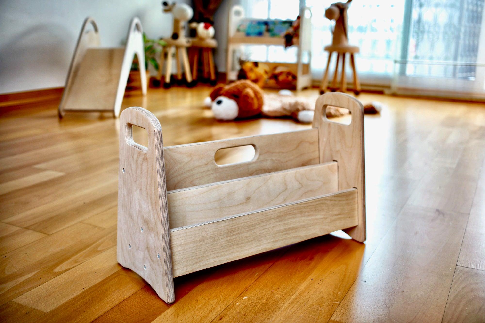 Small wooden bookshelf by Red Oceanus, featuring multiple shelves and a compact design for storing books and decorative items.