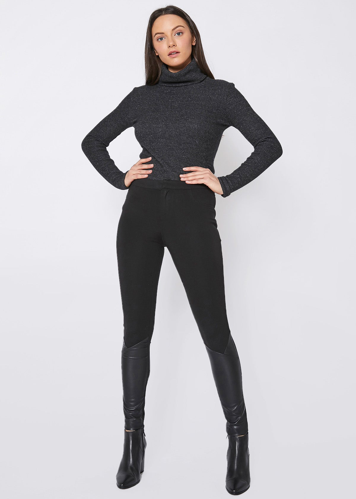 Black leather contrast skinny pants by Lemon Hera, showcasing a fitted design with sleek, stylish details.