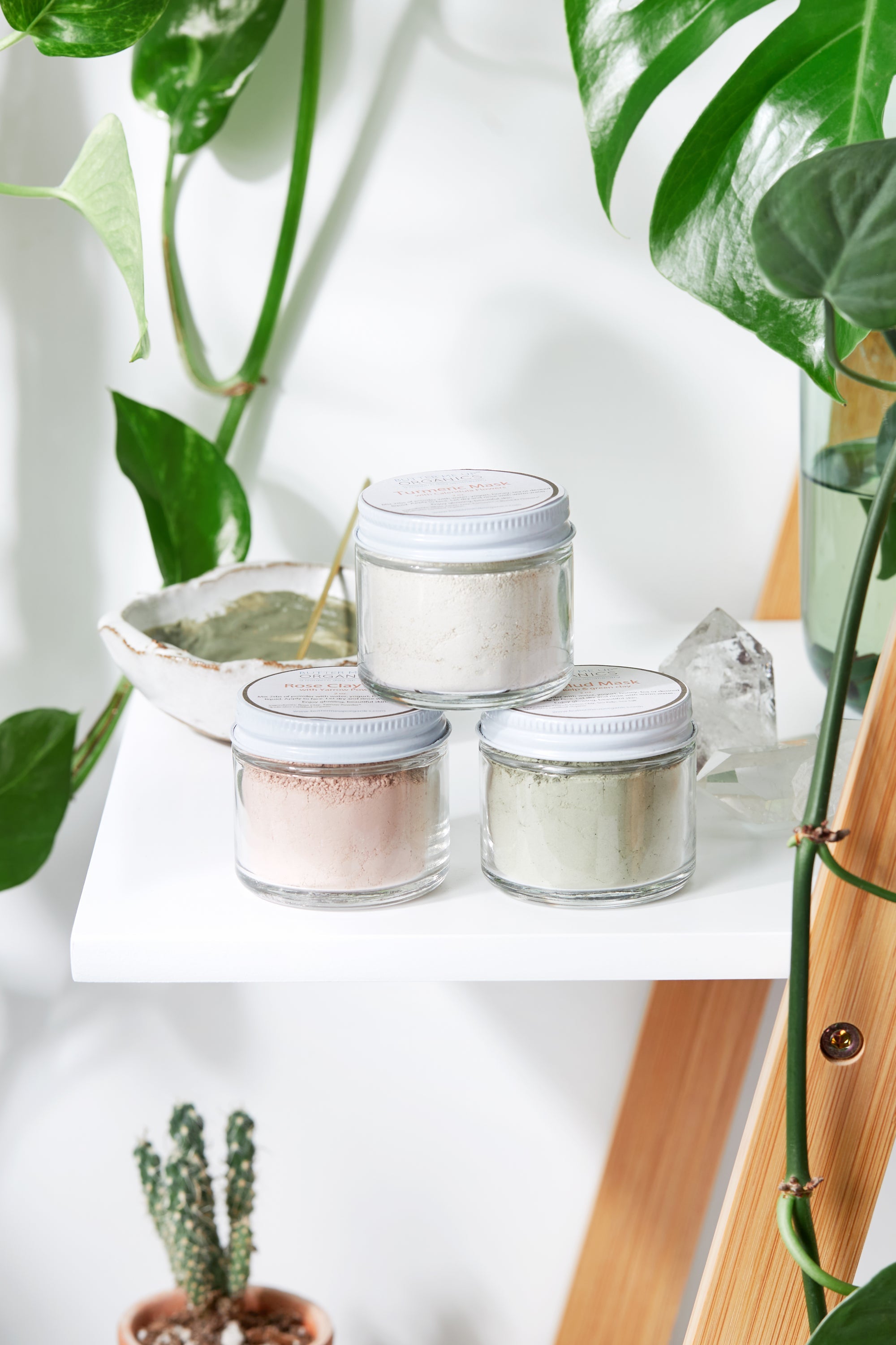 White Smokey clay face mask trio featuring rose, French green, and kaolin clay with turmeric for skin detox and revitalization.
