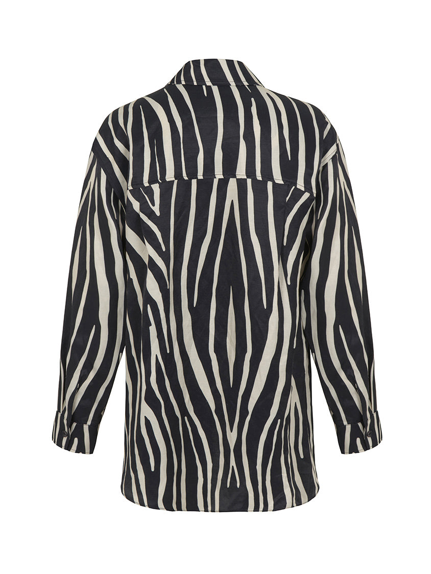Women’s zebra print oversized linen shirt by Bronze Aphrodite, featuring relaxed fit and stylish zebra pattern.