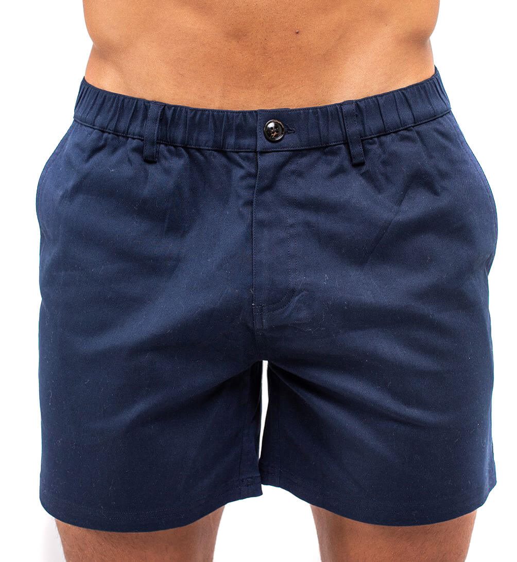 Ruby Tartarus navy cotton swim shorts displayed flat, showing waistband and relaxed fit, ideal for beach or poolside wear.