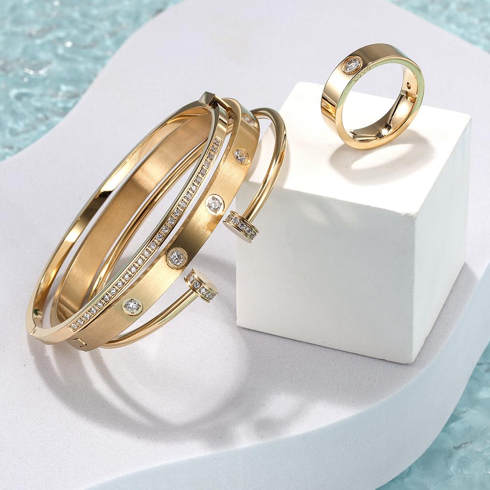 Layered bangle and ring jewelry set from Lavender Phoebe featuring multiple silver-toned bangles and rings.